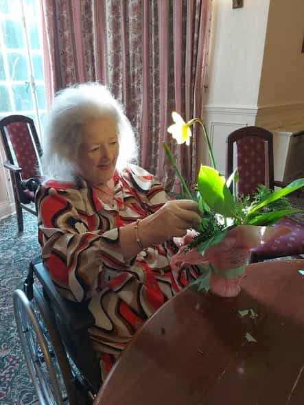 Celebrating a special resident birthday milestone with personalized cake