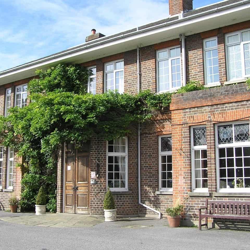 Stewton House Georgian exterior draped in climbing wisteria