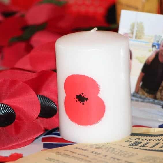 Remembrance poppy candle display in the manor lounge